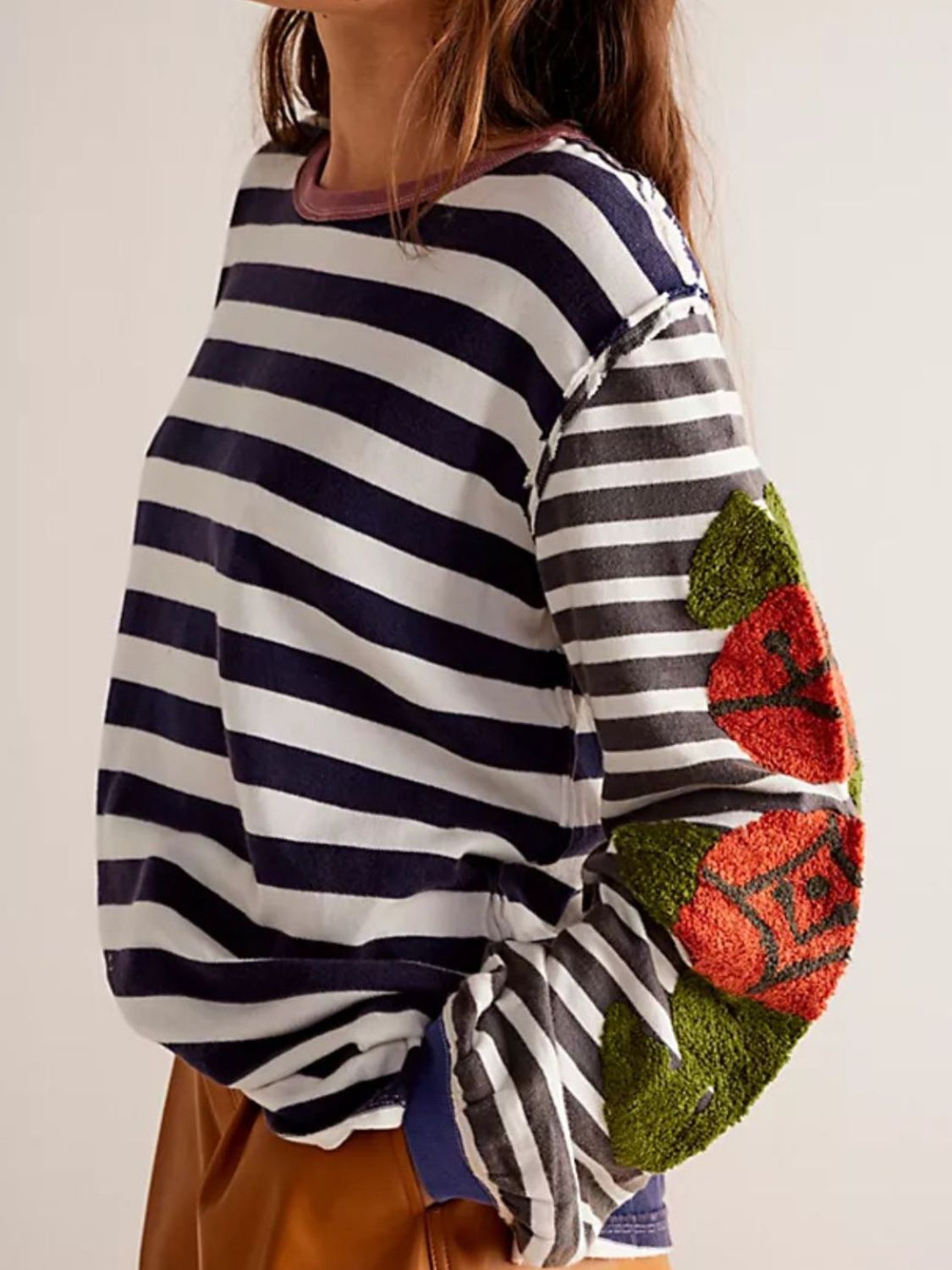 Striped long sleeve tee with embroidered floral detail on sleeves