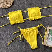 Yellow bandeau bikini set with ruffled trim and tie sides