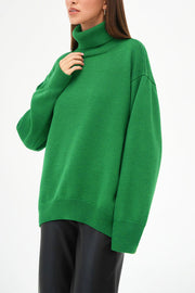 Mid Green relaxed roll-neck sweater with a boxy knit cut and ribbed cuffs and hem.
