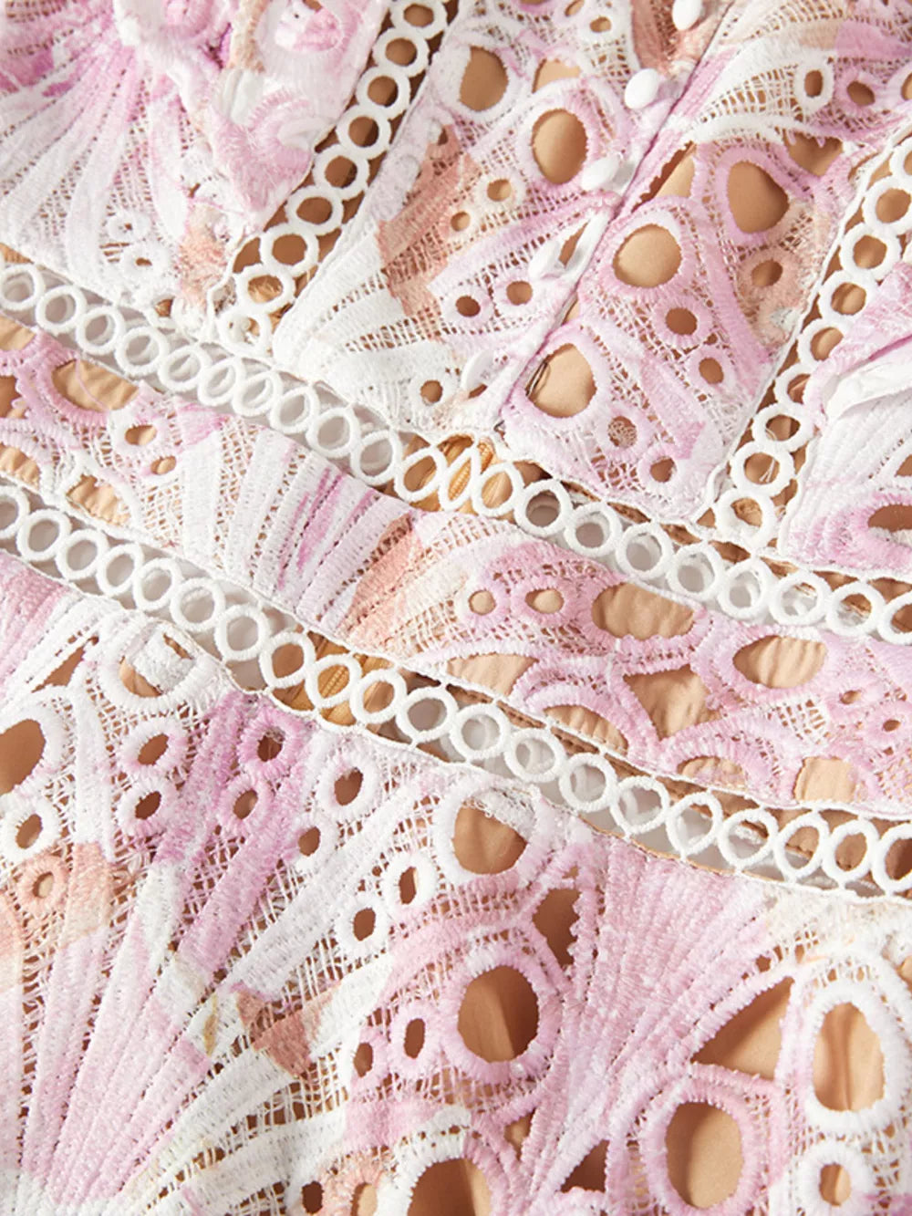 Pink floral lace maxi gown with cutout details and button accents.