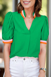 Green colorblock puff sleeve blouse with contrast trim and v-neck
