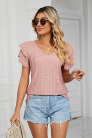 Blush pink eyelet knit blouse with v-neck and flutter sleeves