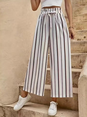 High-waisted palazzo pants with black and red vertical stripes and a drawstring waist.