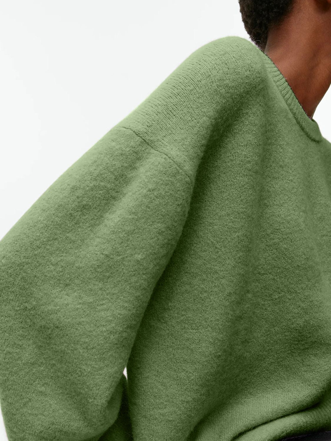 Oversized brushed knit crewneck sweater in Gum Leaf green with relaxed fit and crew neckline.