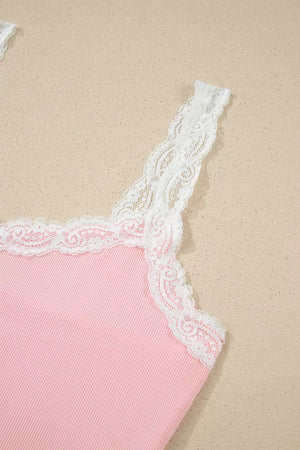Pink ribbed cami pajama top with white lace trim and straps.