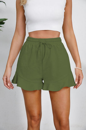 Green linen blend shorts with drawstring waist and flounce hem