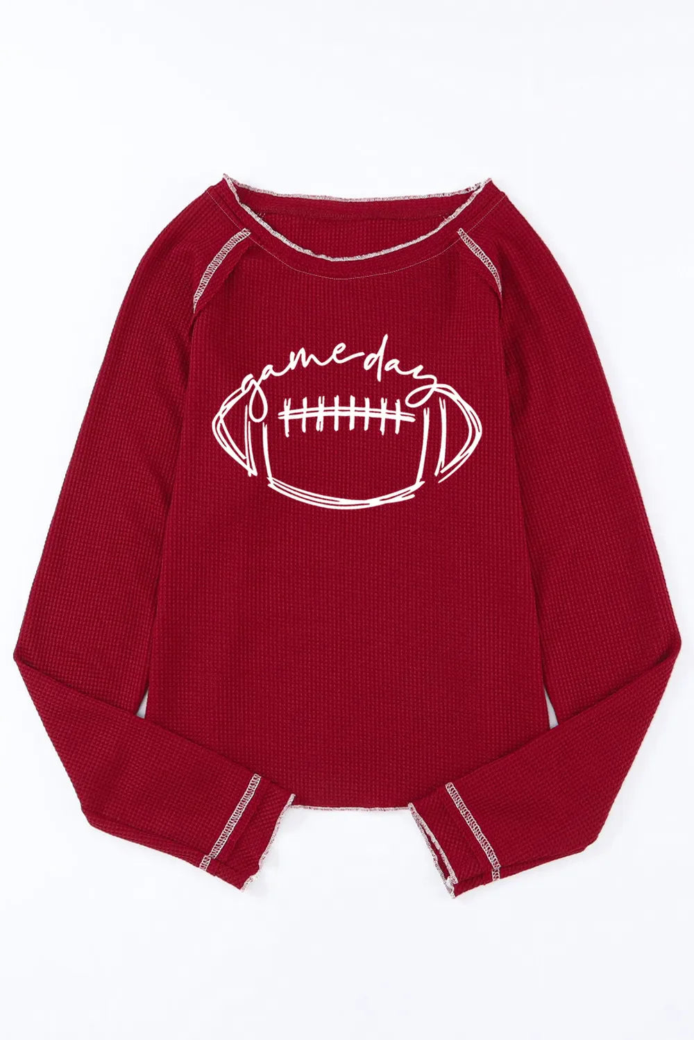 Burgundy waffle knit crewneck top with white "game day" football graphic and contrast stitching.