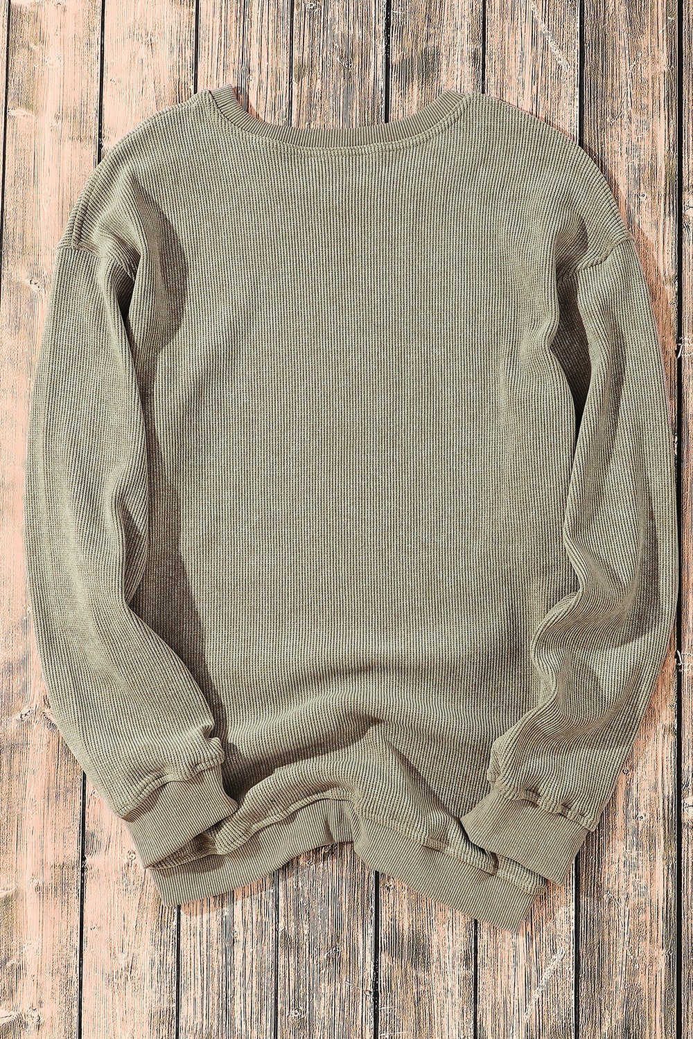 Textured ribbed crewneck pullover in Sage, featuring a relaxed fit and long sleeves.