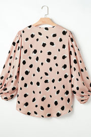 Dust Storm spot print silk blouse with blouson sleeves and gathered cuffs.