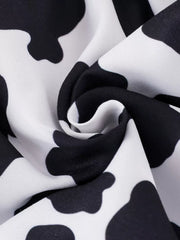 Children's Cow Print Ruffle Jumpsuit in Brown And White, fabric detail