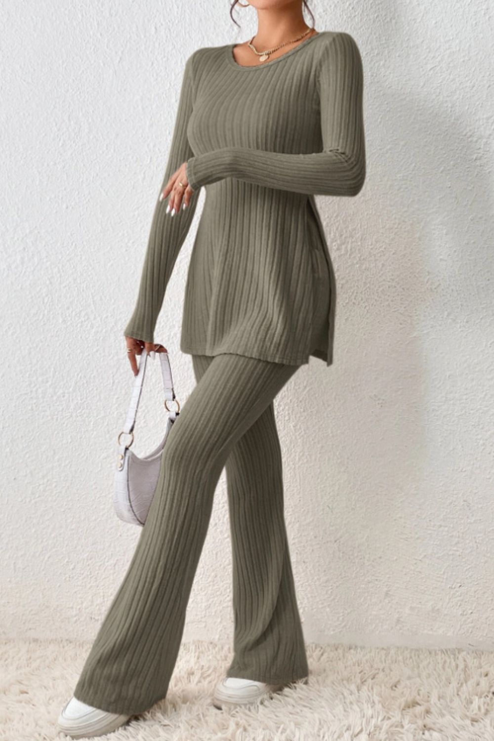 Olive brown ribbed knit co-ord set with side slit tunic and flared pants.