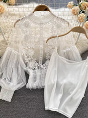 White lace embroidered blouse with sheer puff sleeves and matching cami.