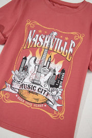 Burnt coral graphic tee with Nashville Music City guitar and city skyline print.