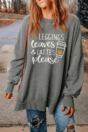 Dark gray graphic sweatshirt with "Leggings Leaves & Lattes Please" print and coffee cup graphic.