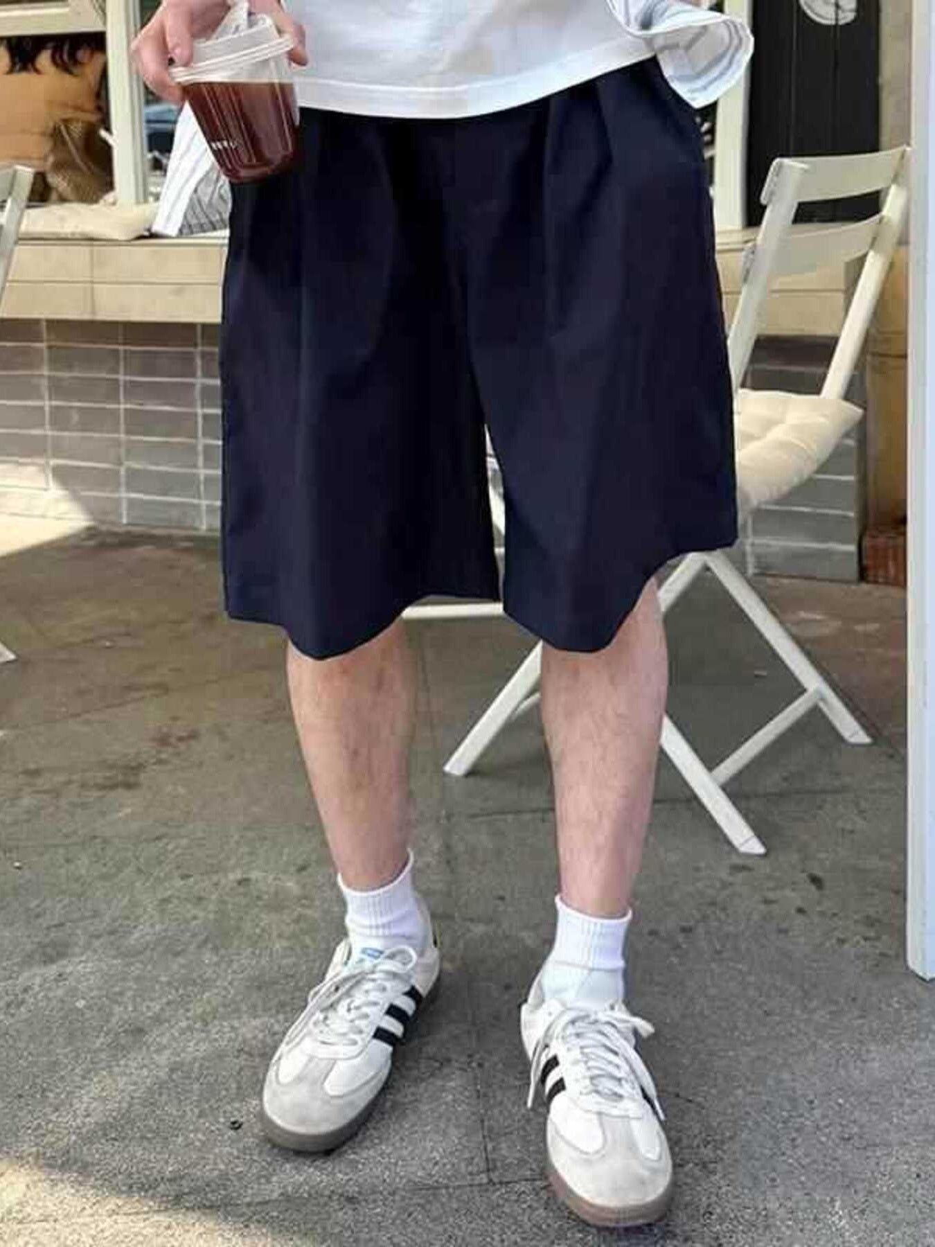 Navy blue relaxed fit chino shorts with a comfortable, breathable feel.