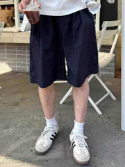 Navy blue relaxed fit chino shorts with a comfortable, breathable feel.