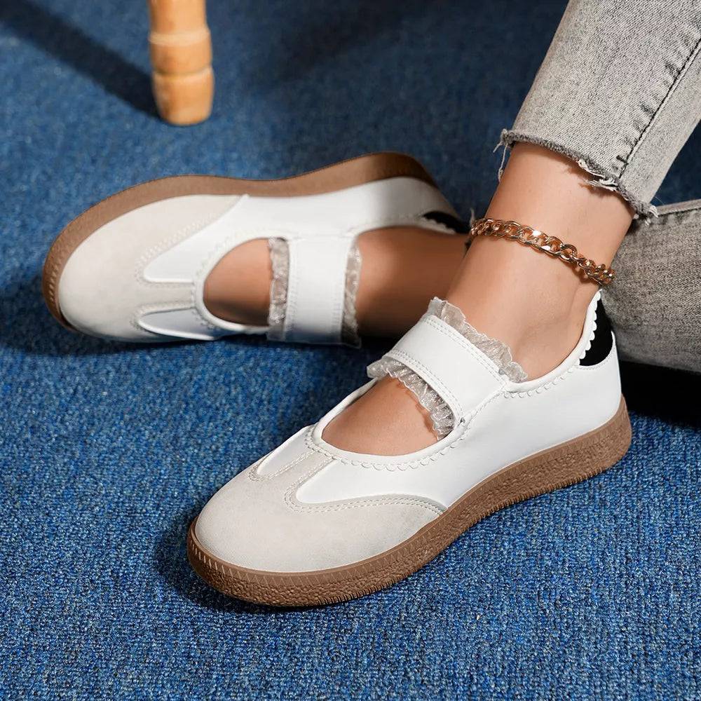 Round Toe Slip-ons in Black, model styling view
