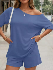 Blue asymmetrical one-shoulder top and shorts set with pockets