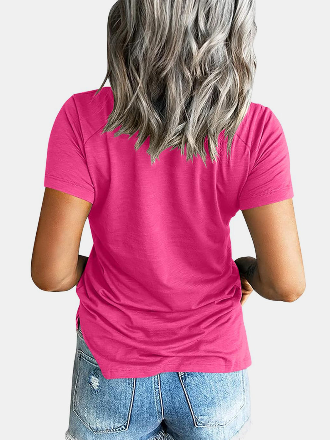 Hot pink raglan pocket t-shirt with short sleeves and a relaxed fit.