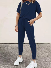 Navy blue casual top and jogger pants set with drawstring waist and crew neck.