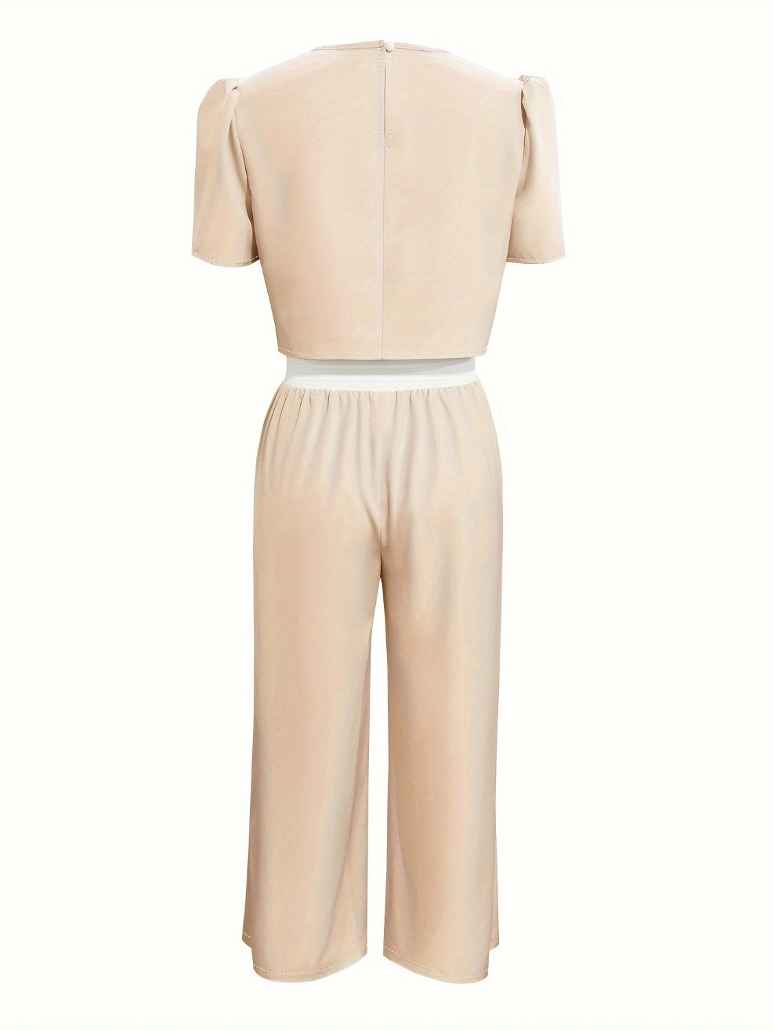 Beige cropped puff-sleeve top with white waistband and matching wide-leg pants.