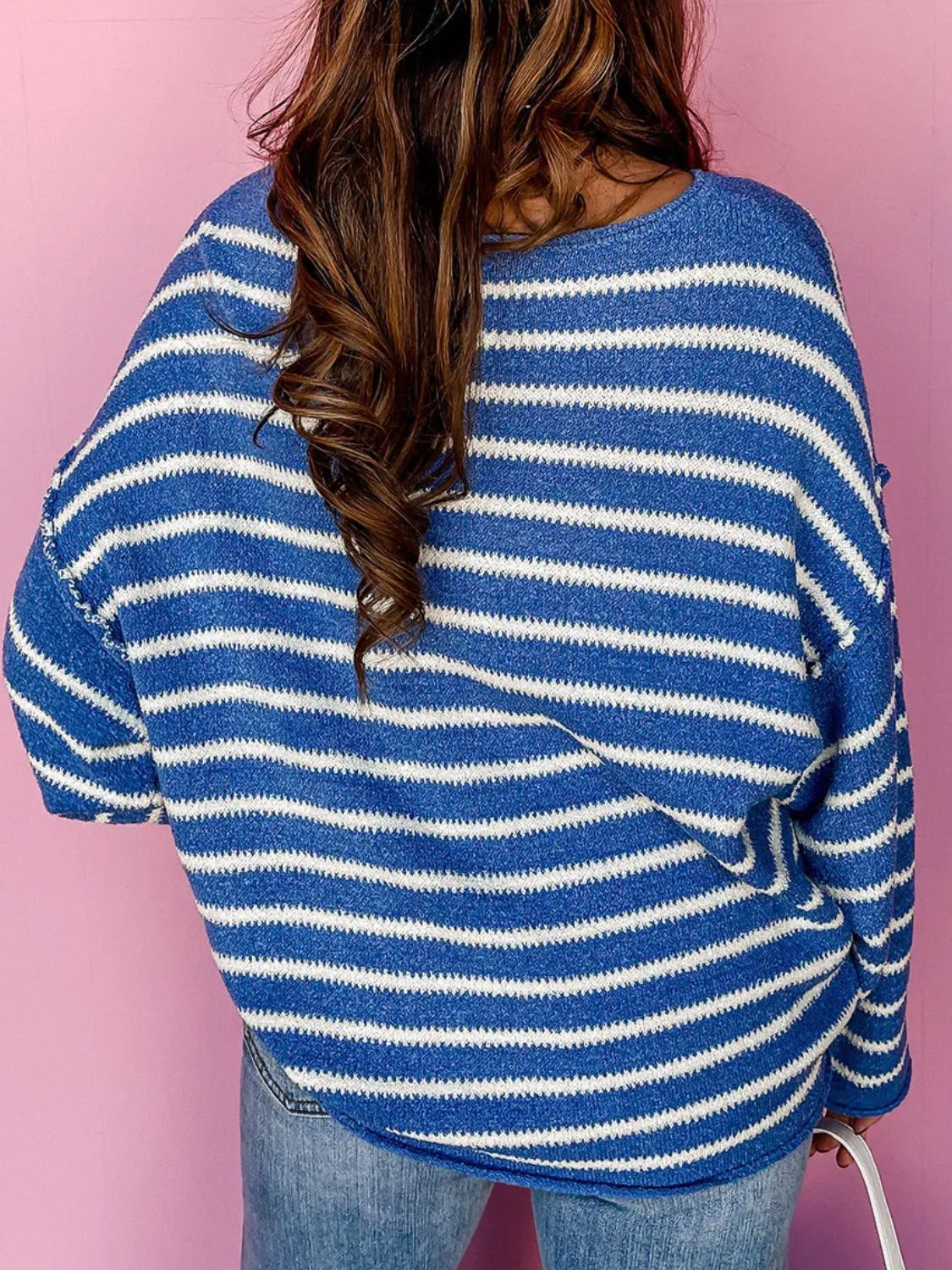 Royal blue and white striped relaxed fit crewneck sweater with textured knit.