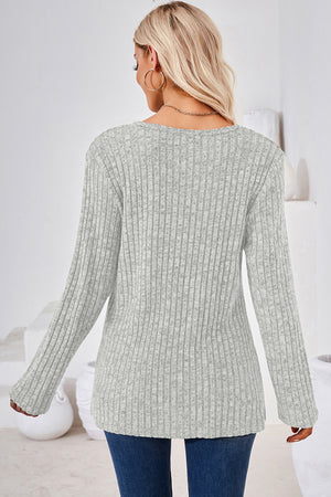 Light Gray ribbed knit sweater with long sleeves and a crew neck.