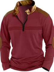 Burgundy quarter-zip pullover with contrast collar, shoulder panels, elbow patches, and horizontal chest stripes.