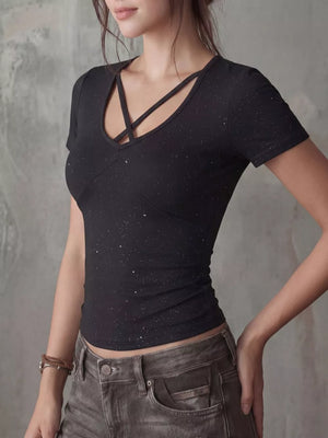 Black crossover V-neck t-shirt with glitter detail and short sleeves.