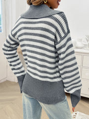 Light gray and white striped knit pullover sweater with a wide collar and ribbed hem.