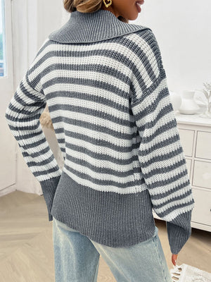 Light gray and white striped knit pullover sweater with a wide collar and ribbed hem.