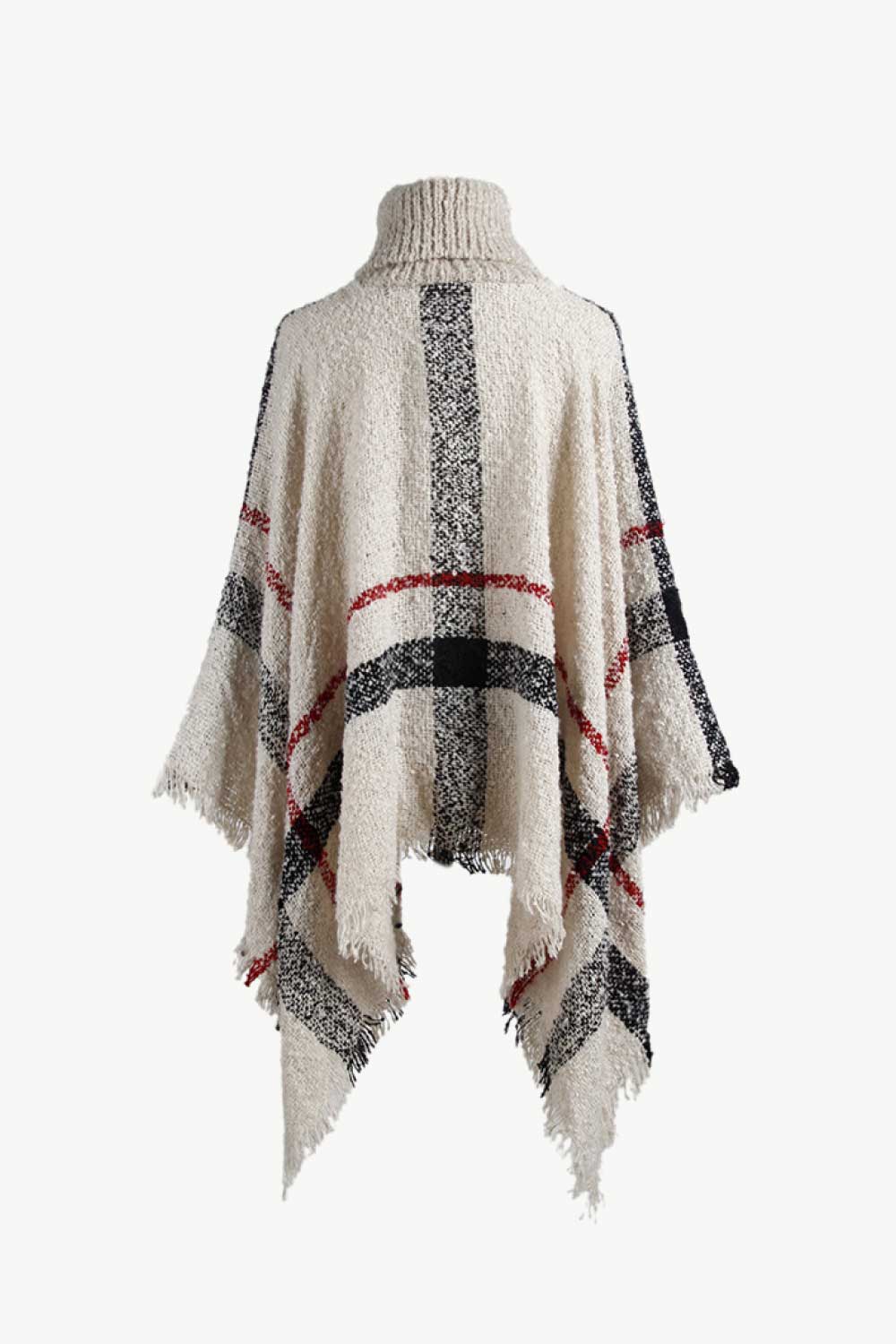 Beige plaid turtleneck cape with fringe detail and textured acrylic knit.