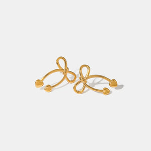 Gold bow drop earrings with heart tips