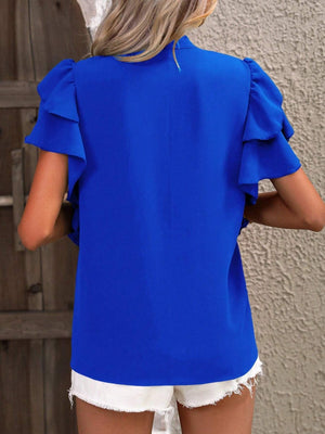 Royal blue blouse with ruffled short sleeves and a plunge neckline.