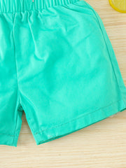 Turquoise cotton baby shorts with elastic waistband and dinosaur print detail.