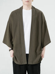 Oversized casual open front jacket in army green with wide sleeves and a relaxed fit.