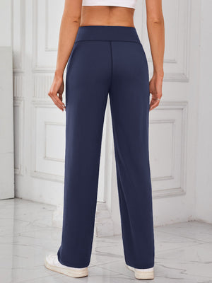 Dark navy wide-leg lounge trousers with a high waist and straight leg, shown from the back.