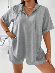 Gray short sleeve hoodie with quarter zip and matching shorts set.