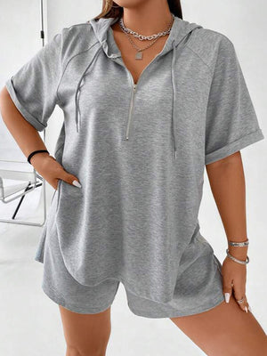 Gray short sleeve hoodie with quarter zip and matching shorts set.