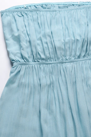Light blue bandeau jumpsuit with smocked bodice and wide legs.