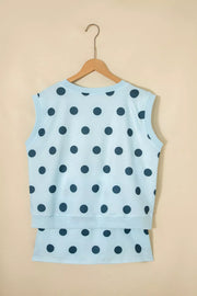 Pastel blue polka dot two-piece set with crew neck sleeveless top and skort.