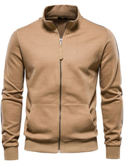 Camel track jacket with zip-up front, mock neck, and side stripe detail.