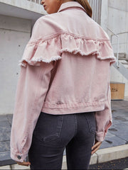 Blush pink denim trucker jacket with frayed ruffle detail across the back yoke.