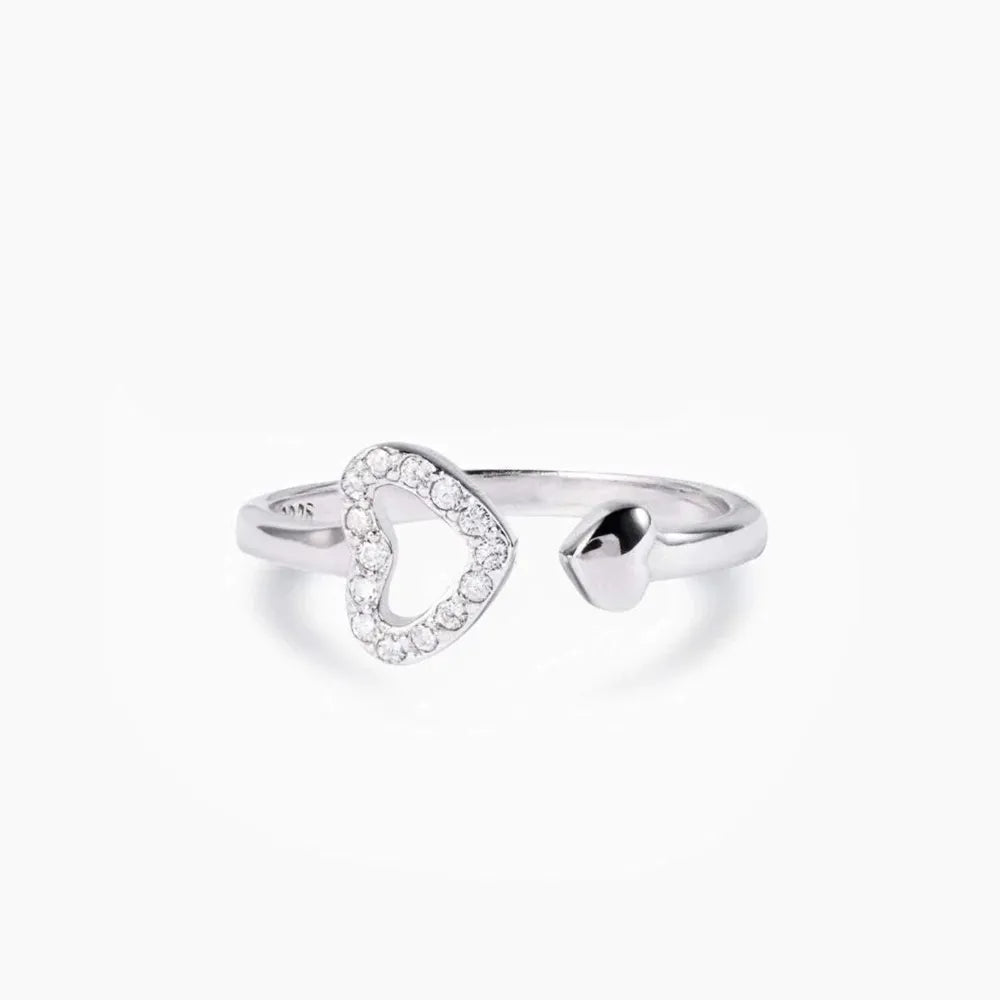 Silver open heart ring with pavé detail and a smaller heart accent