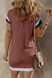 Ribbed tee dress with colorblock sleeves in black, white, and tan.