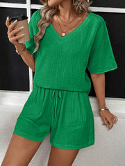Green textured gauze lounge set with V-neck top and drawstring shorts