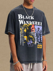 Black Wanderer graphic tee with washed cotton texture and abstract art print.