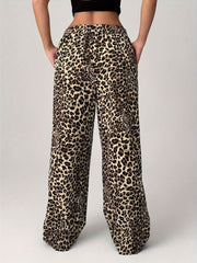 Leopard print palazzo lounge trousers with a wide leg and elastic waistband.