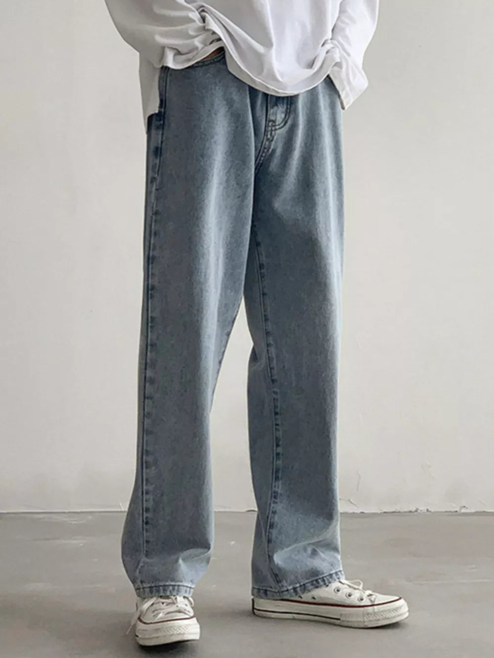Men's Loose Fit Jeans in Black, editorial view