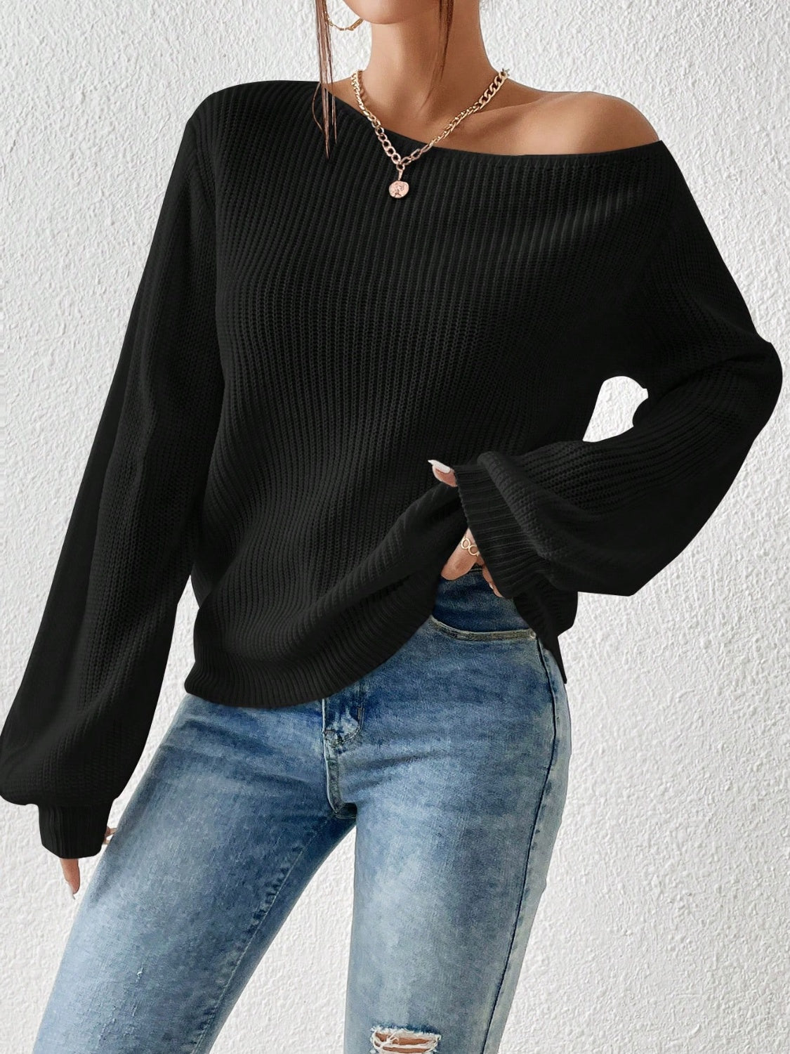 Black ribbed knit off-shoulder top with balloon sleeves
